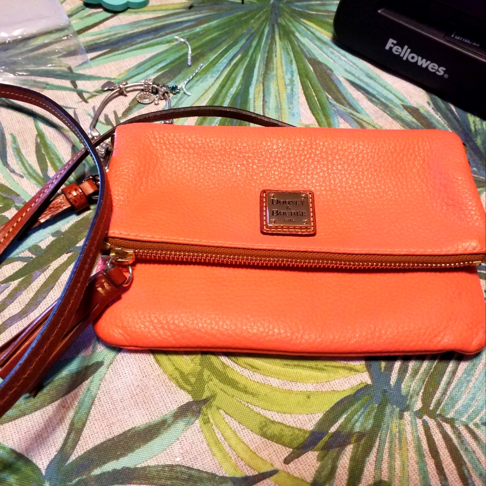 Coral color Dooney and Bourke crossbody purse